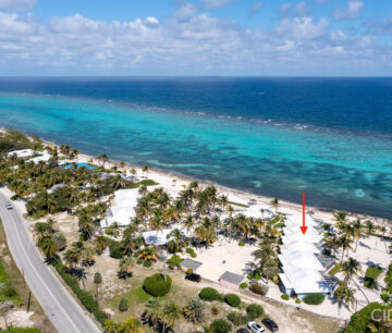 CAYMAN KAI SEALODGE #13 BEACHFRONT CONDO WITH IMPRESSIVED RENTAL HISTORY