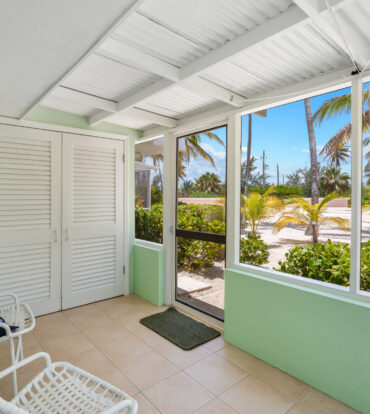 CAYMAN KAI SEALODGE #13 BEACHFRONT CONDO WITH IMPRESSIVED RENTAL HISTORY
