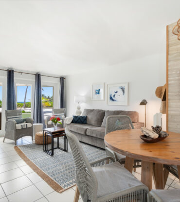 CAYMAN KAI SEALODGE #13 BEACHFRONT CONDO WITH IMPRESSIVED RENTAL HISTORY
