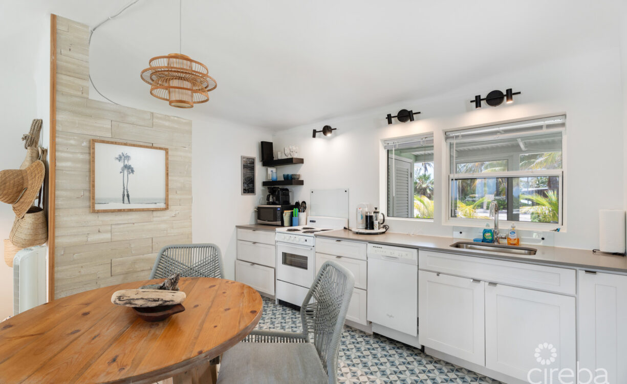 CAYMAN KAI SEALODGE #13 BEACHFRONT CONDO WITH IMPRESSIVED RENTAL HISTORY