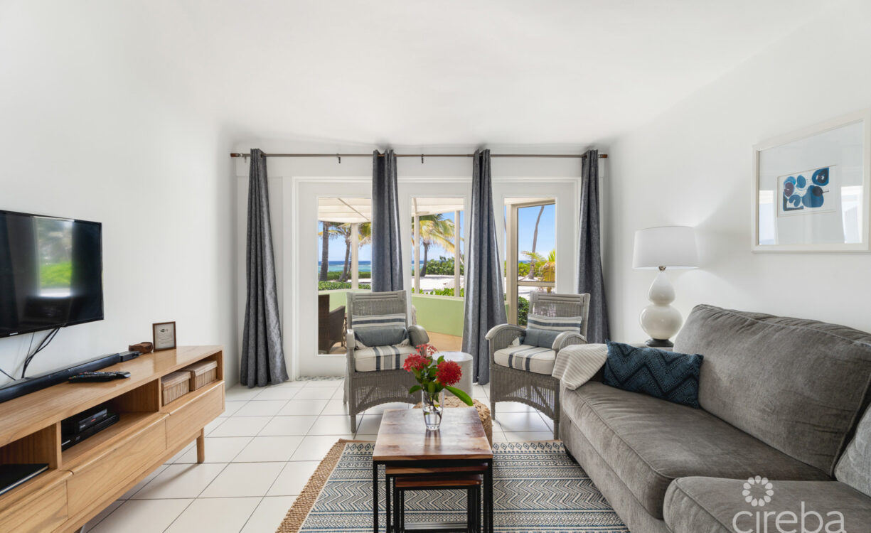 CAYMAN KAI SEALODGE #13 BEACHFRONT CONDO WITH IMPRESSIVED RENTAL HISTORY