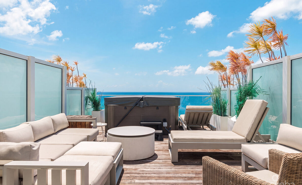 THREE-LEVEL OCEANFRONT FIN PENTHOUSE  #30 PLUS 2 GARAGES