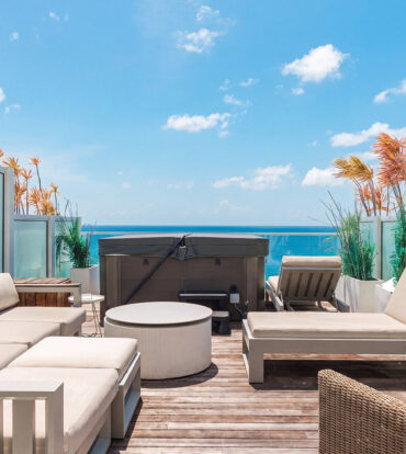 THREE-LEVEL OCEANFRONT FIN PENTHOUSE  #30 PLUS 2 GARAGES