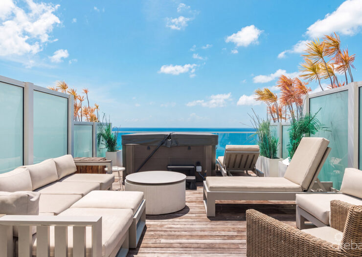 THREE-LEVEL OCEANFRONT FIN PENTHOUSE  #30 PLUS 2 GARAGES