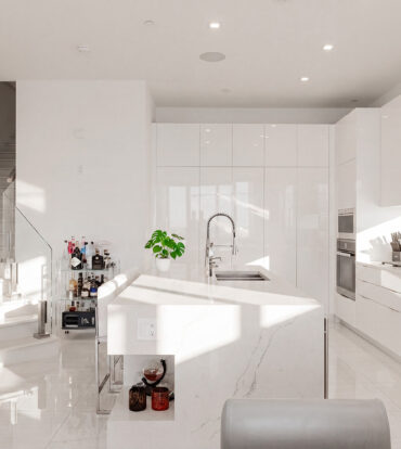 THREE-LEVEL OCEANFRONT FIN PENTHOUSE  #30 PLUS 2 GARAGES