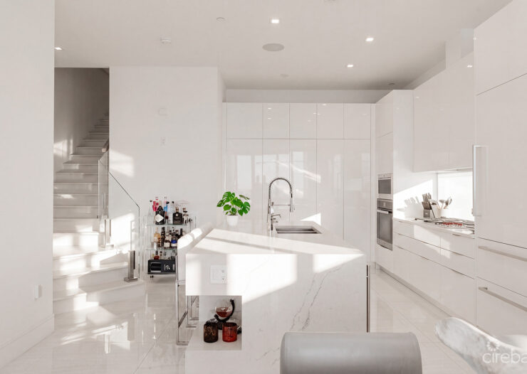 THREE-LEVEL OCEANFRONT FIN PENTHOUSE  #30 PLUS 2 GARAGES