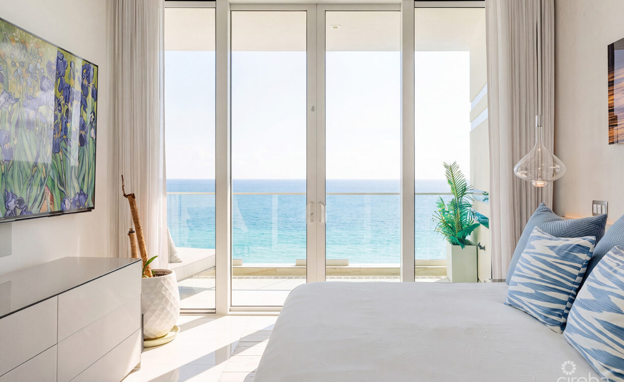 THREE-LEVEL OCEANFRONT FIN PENTHOUSE  #30 PLUS 2 GARAGES