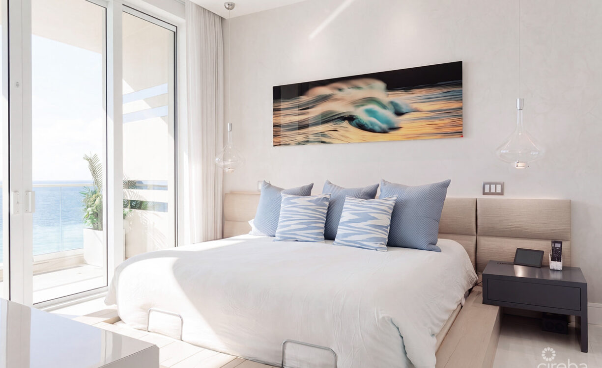 THREE-LEVEL OCEANFRONT FIN PENTHOUSE  #30 PLUS 2 GARAGES