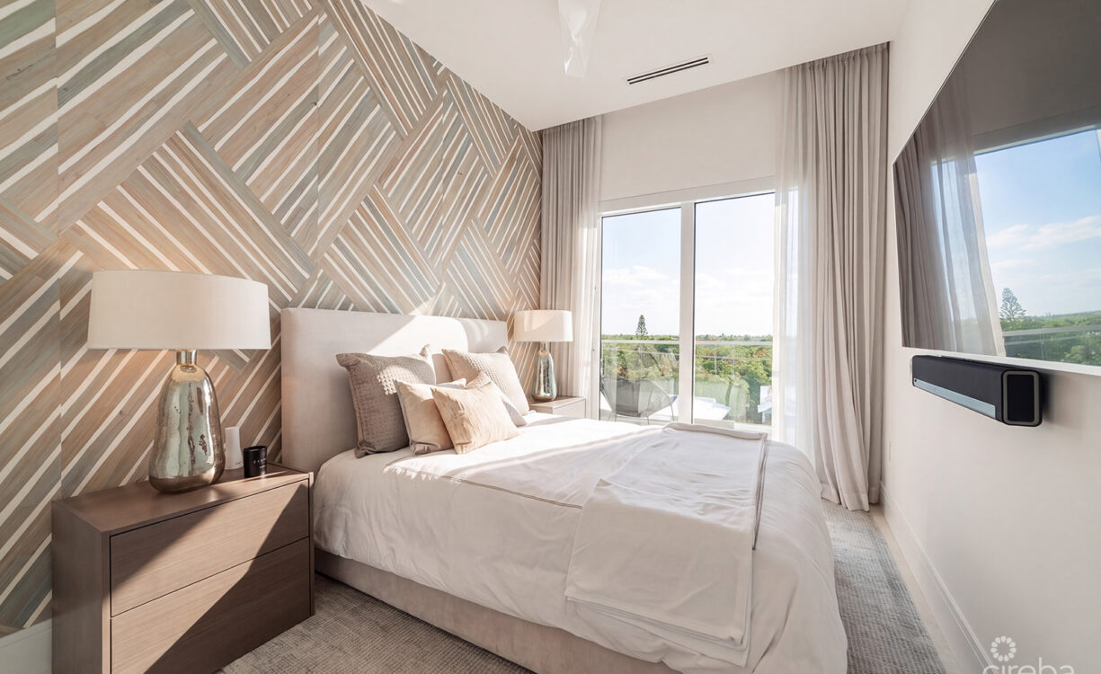 THREE-LEVEL OCEANFRONT FIN PENTHOUSE  #30 PLUS 2 GARAGES