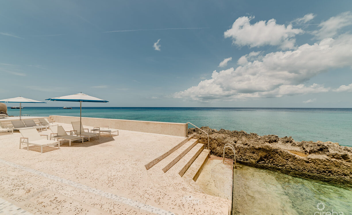 THREE-LEVEL OCEANFRONT FIN PENTHOUSE  #30 PLUS 2 GARAGES