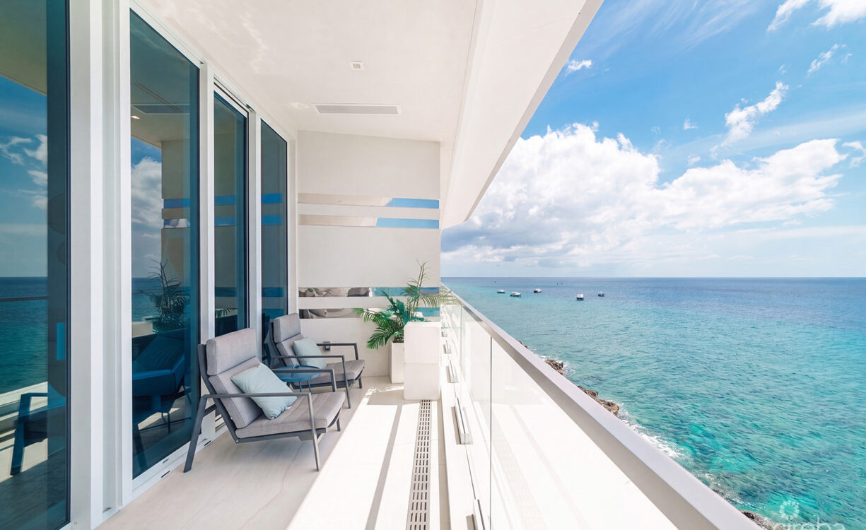 THREE-LEVEL OCEANFRONT FIN PENTHOUSE  #30 PLUS 2 GARAGES