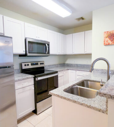LAKESIDE K36 RENOVATED 2 BEDROOM CONDO OPPOSITE CAMANA BAY