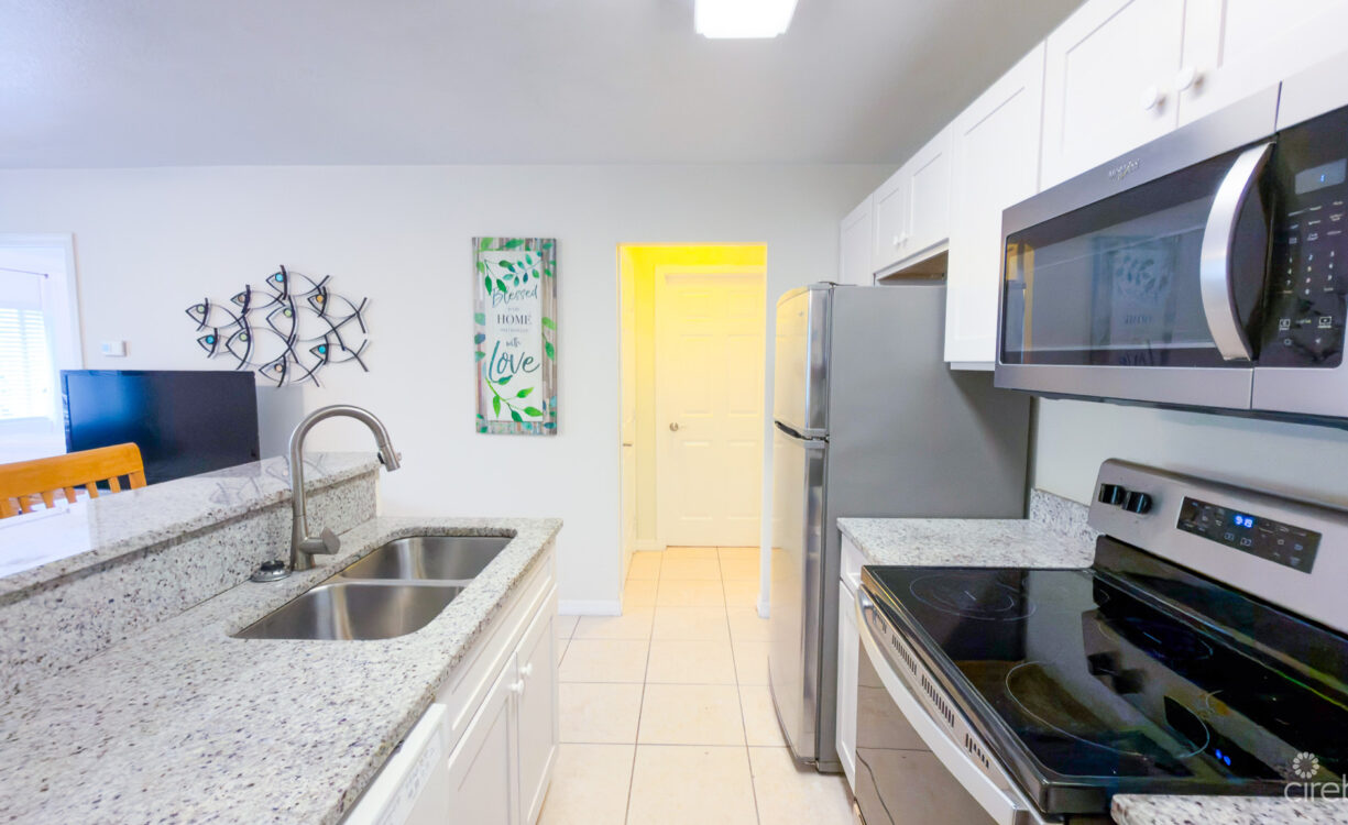 LAKESIDE K36 RENOVATED 2 BEDROOM CONDO OPPOSITE CAMANA BAY