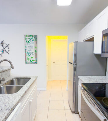 LAKESIDE K36 RENOVATED 2 BEDROOM CONDO OPPOSITE CAMANA BAY