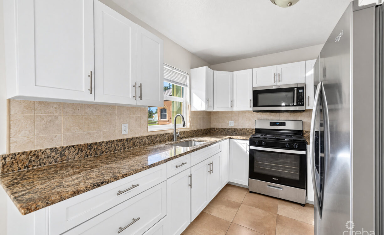 3 BEDROOM HOME ON DUPLEX LOT W/APPROVED PLANS FOR AN ADDITIONAL 4-BEDROOM HOME
