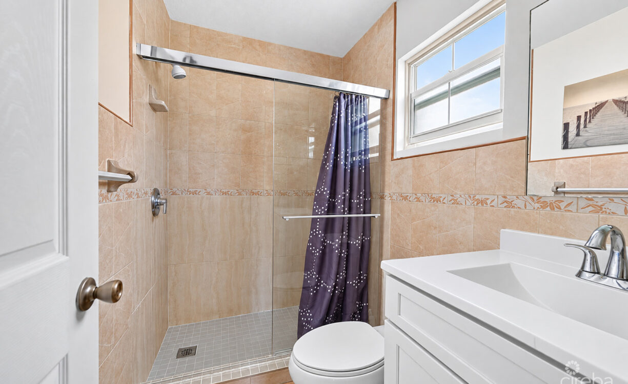 3 BEDROOM HOME ON DUPLEX LOT W/APPROVED PLANS FOR AN ADDITIONAL 4-BEDROOM HOME