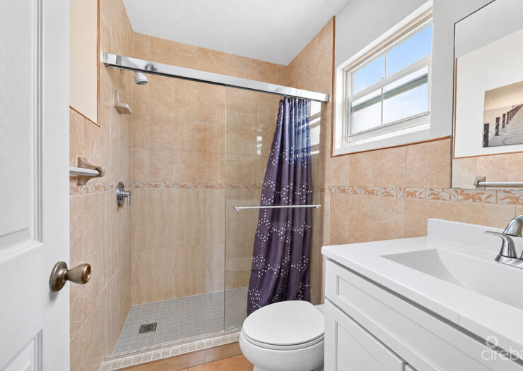 3 BEDROOM HOME ON DUPLEX LOT W/APPROVED PLANS FOR AN ADDITIONAL 4-BEDROOM HOME