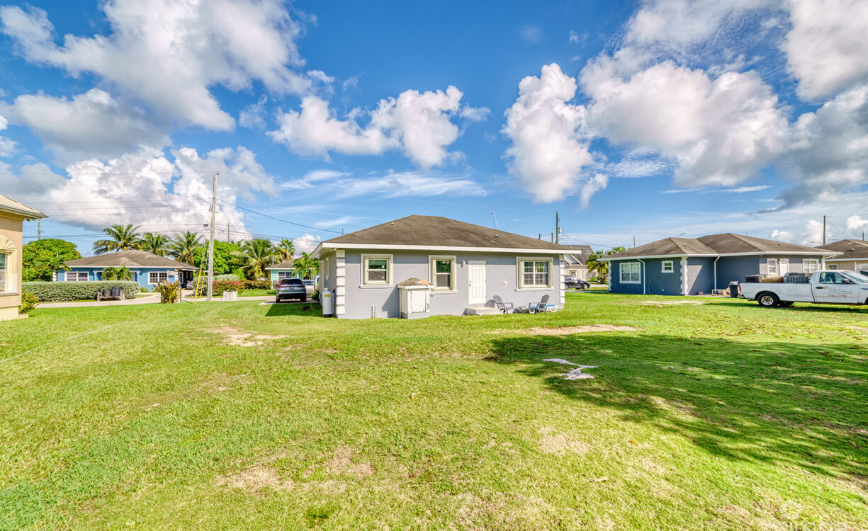 3 BEDROOM HOME ON DUPLEX LOT W/APPROVED PLANS FOR  ADDITIONAL 4-BEDROOM HOME