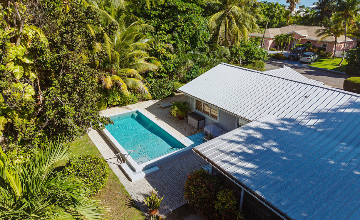 RARE DOUBLE-LOT OASIS BUNGALOW  WITH POOL IN SNUG HARBOUR