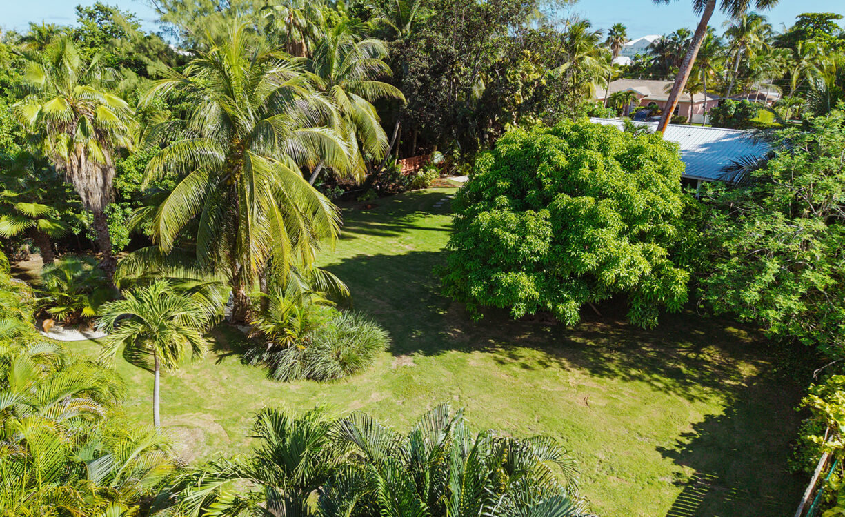 RARE DOUBLE-LOT OASIS BUNGALOW  WITH POOL IN SNUG HARBOUR