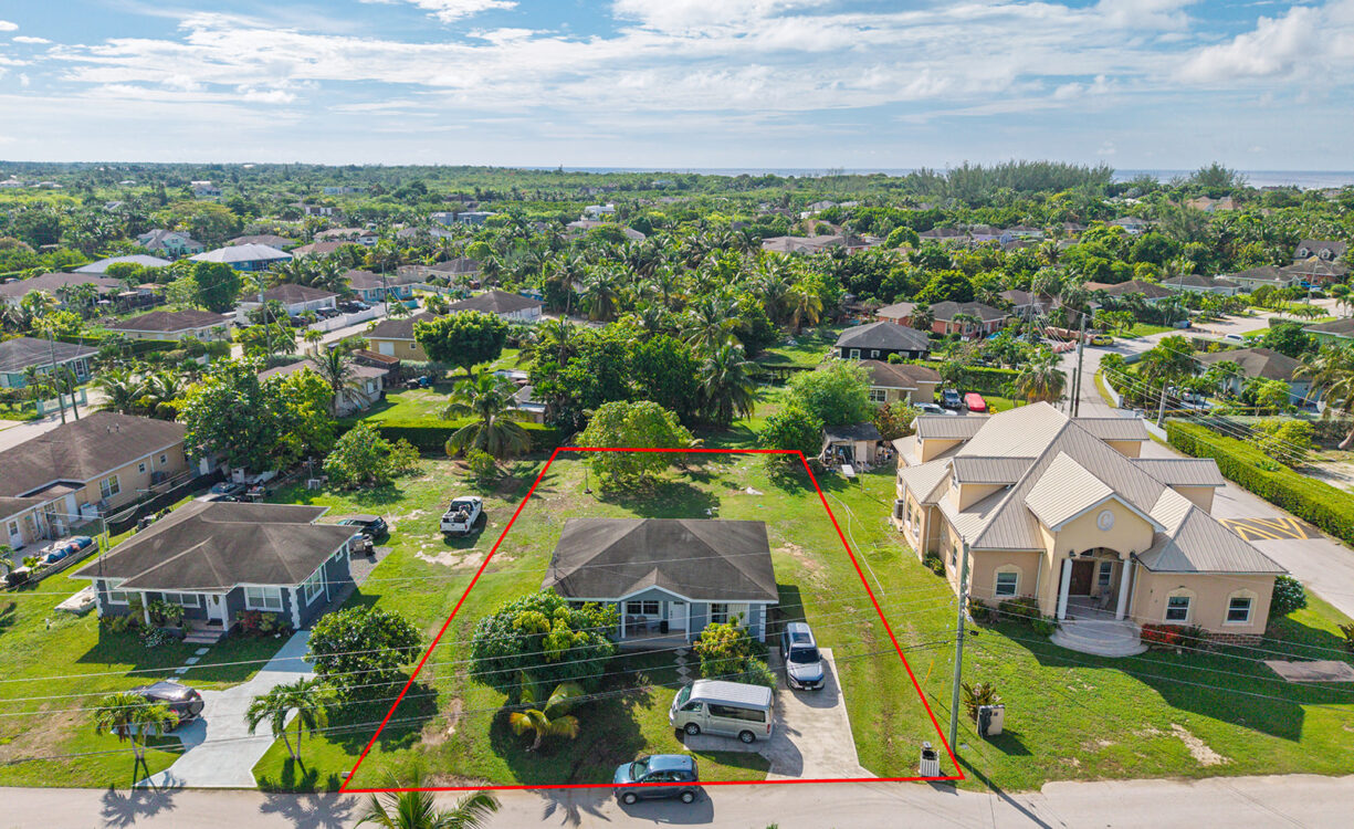 3 BEDROOM HOME ON DUPLEX LOT W/APPROVED PLANS FOR  ADDITIONAL 4-BEDROOM HOME