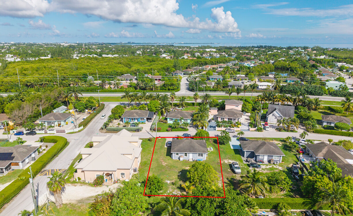 3 BEDROOM HOME ON DUPLEX LOT W/APPROVED PLANS FOR  ADDITIONAL 4-BEDROOM HOME