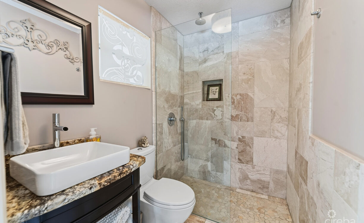 RARE DOUBLE-LOT OASIS BUNGALOW  WITH POOL IN SNUG HARBOUR