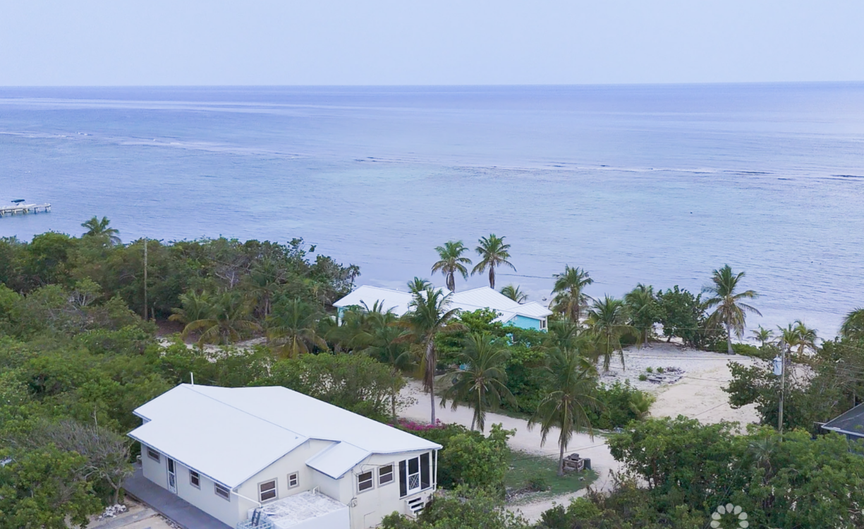 LITTLE CAYMAN OCEAN VIEW RESIDENTIAL HOME WITH BEACHFRONT LOT