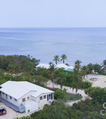 LITTLE CAYMAN OCEAN VIEW RESIDENTIAL HOME WITH BEACHFRONT LOT