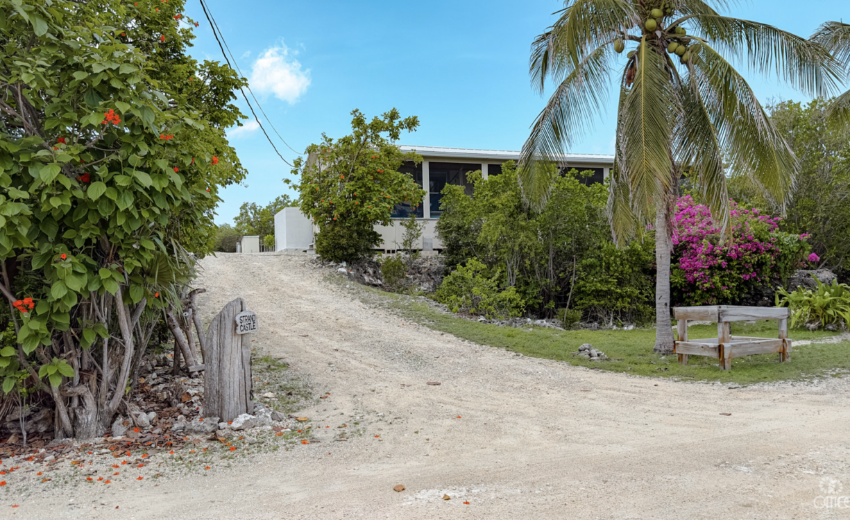 LITTLE CAYMAN OCEAN VIEW RESIDENTIAL HOME WITH BEACHFRONT LOT