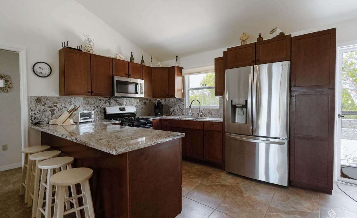 LITTLE CAYMAN OCEAN VIEW RESIDENTIAL HOME WITH BEACHFRONT LOT