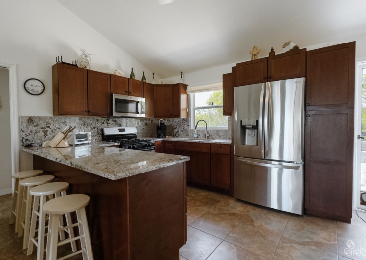 LITTLE CAYMAN OCEAN VIEW RESIDENTIAL HOME WITH BEACHFRONT LOT