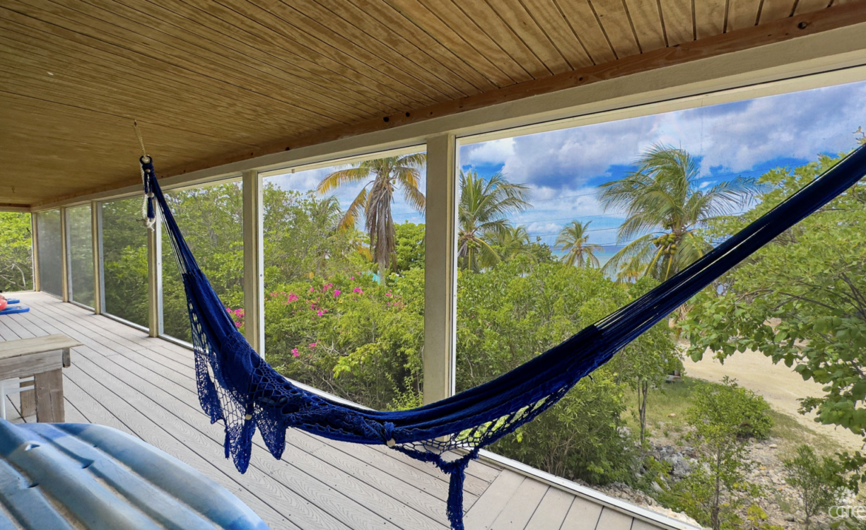 LITTLE CAYMAN OCEAN VIEW RESIDENTIAL HOME WITH BEACHFRONT LOT