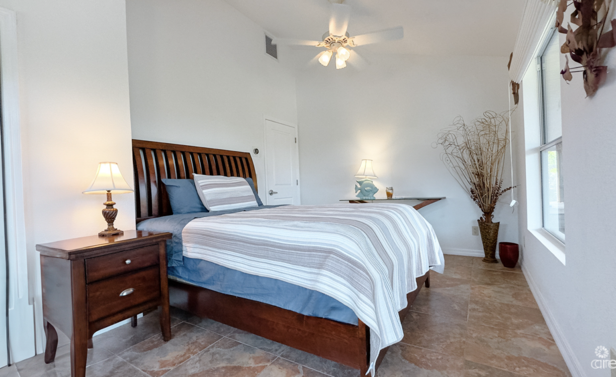 LITTLE CAYMAN OCEAN VIEW RESIDENTIAL HOME WITH BEACHFRONT LOT