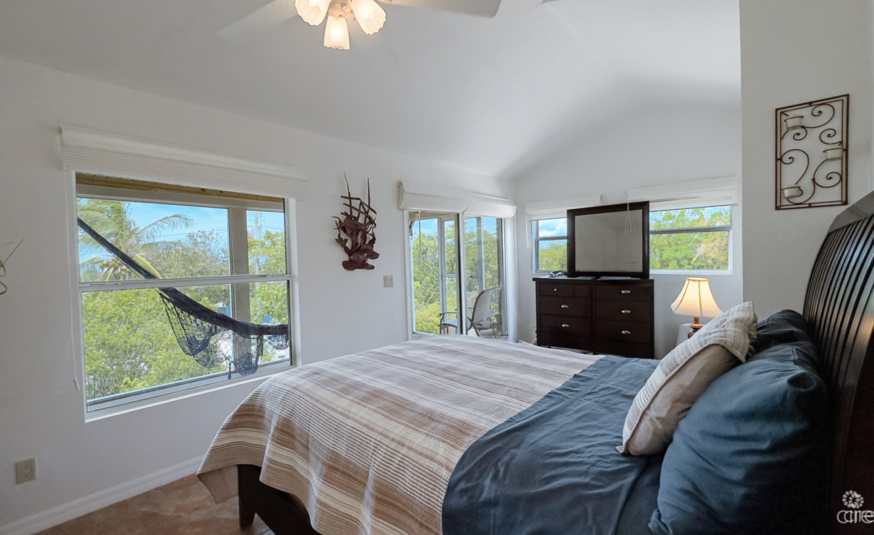 LITTLE CAYMAN OCEAN VIEW RESIDENTIAL HOME WITH BEACHFRONT LOT