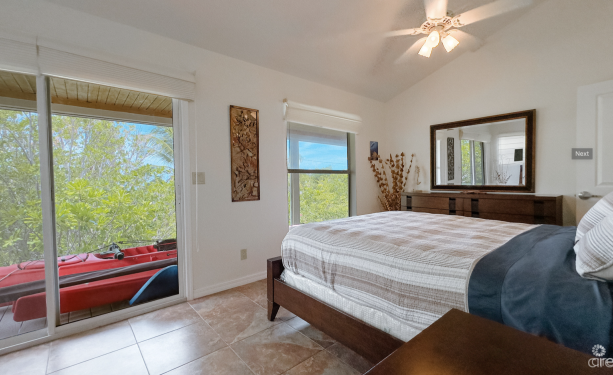 LITTLE CAYMAN OCEAN VIEW RESIDENTIAL HOME WITH BEACHFRONT LOT