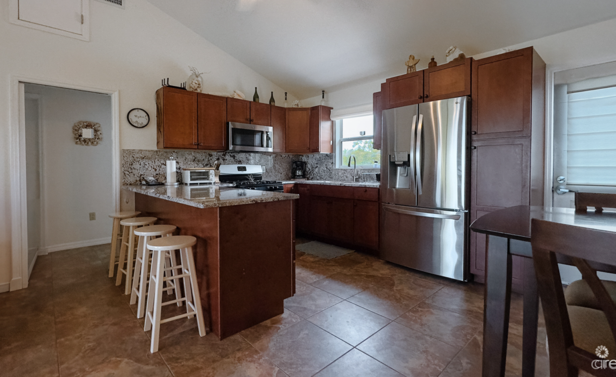 LITTLE CAYMAN OCEAN VIEW RESIDENTIAL HOME WITH BEACHFRONT LOT