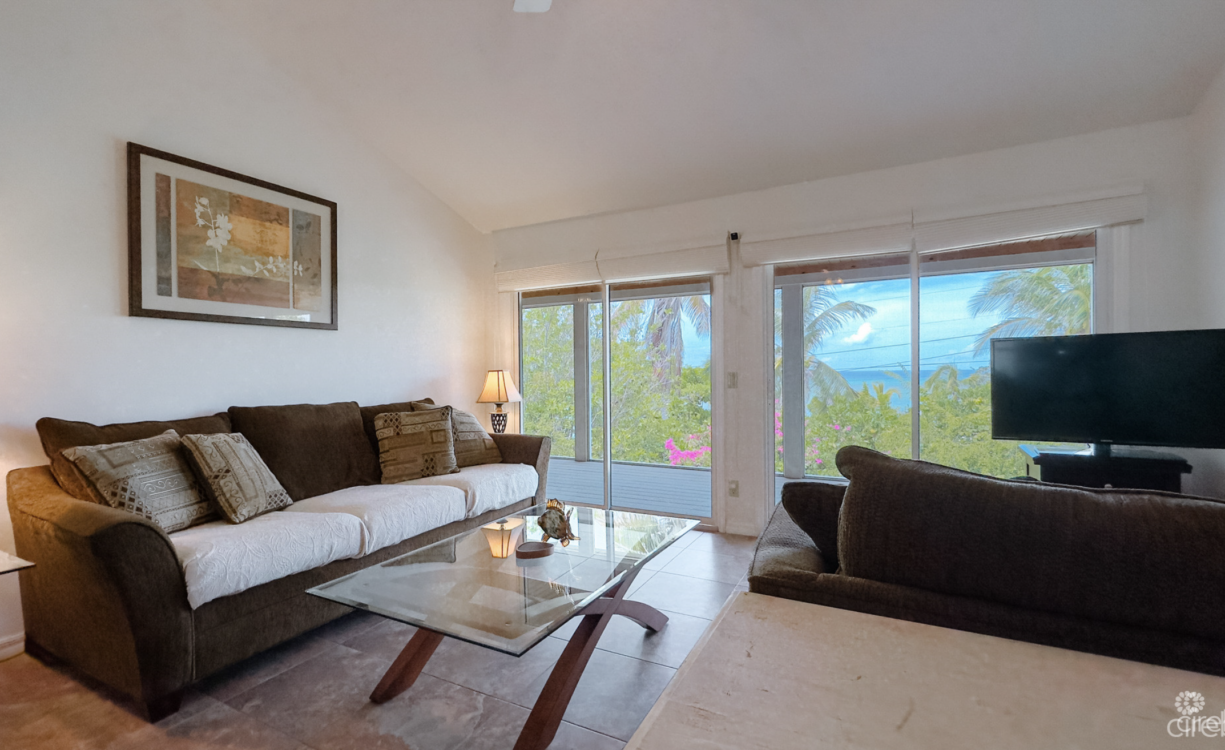 LITTLE CAYMAN OCEAN VIEW RESIDENTIAL HOME WITH BEACHFRONT LOT