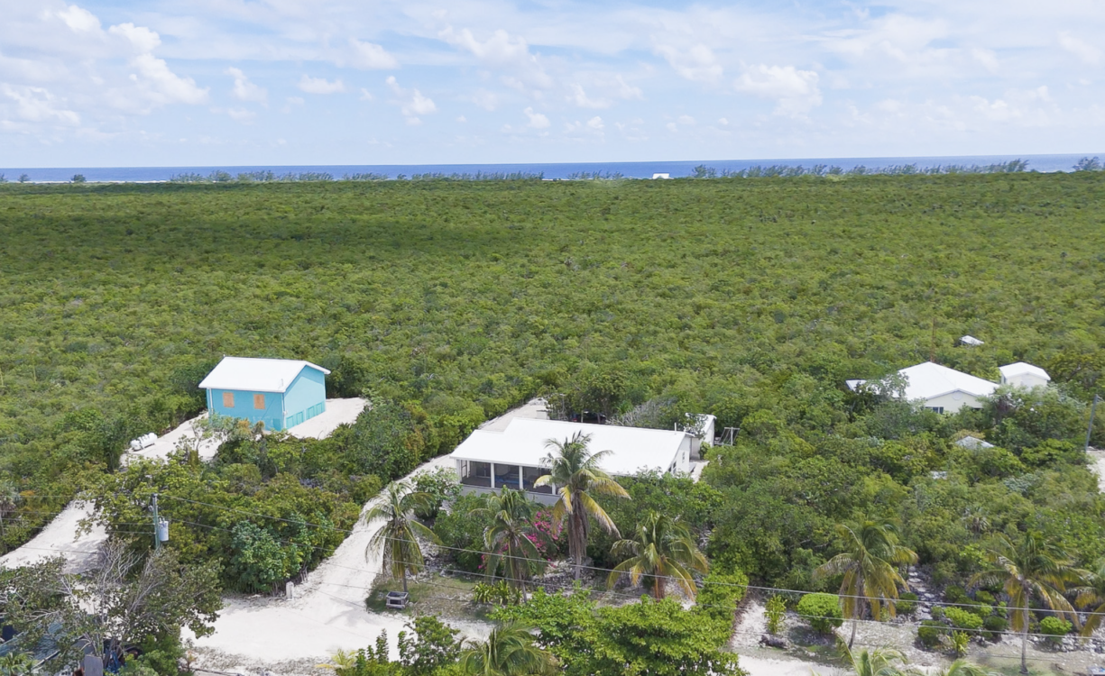 LITTLE CAYMAN OCEAN VIEW RESIDENTIAL HOME WITH BEACHFRONT LOT