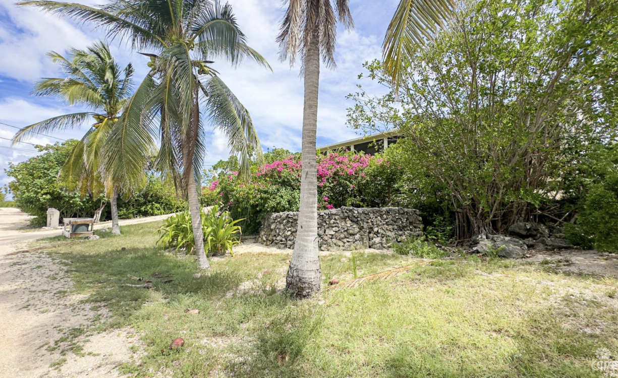 LITTLE CAYMAN OCEAN VIEW RESIDENTIAL HOME WITH BEACHFRONT LOT