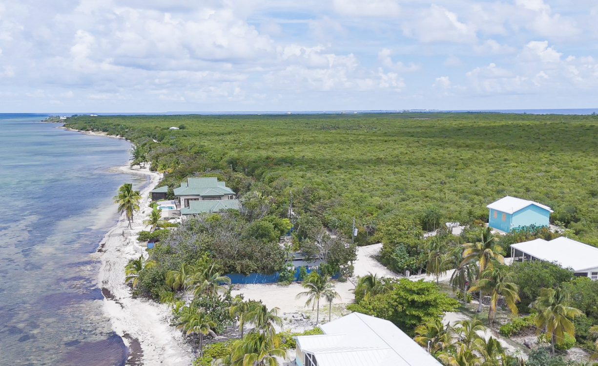 LITTLE CAYMAN OCEAN VIEW RESIDENTIAL HOME WITH BEACHFRONT LOT