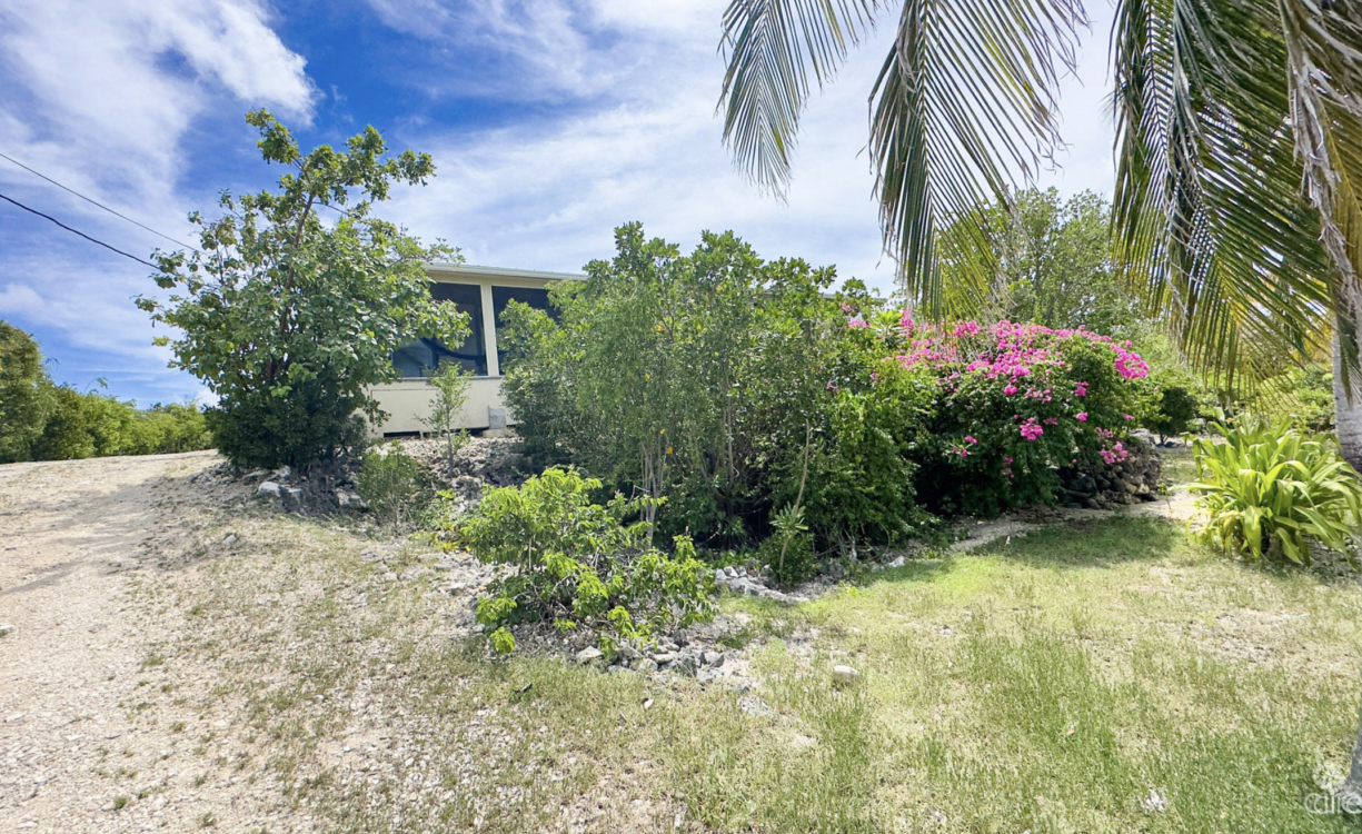 LITTLE CAYMAN OCEAN VIEW RESIDENTIAL HOME WITH BEACHFRONT LOT