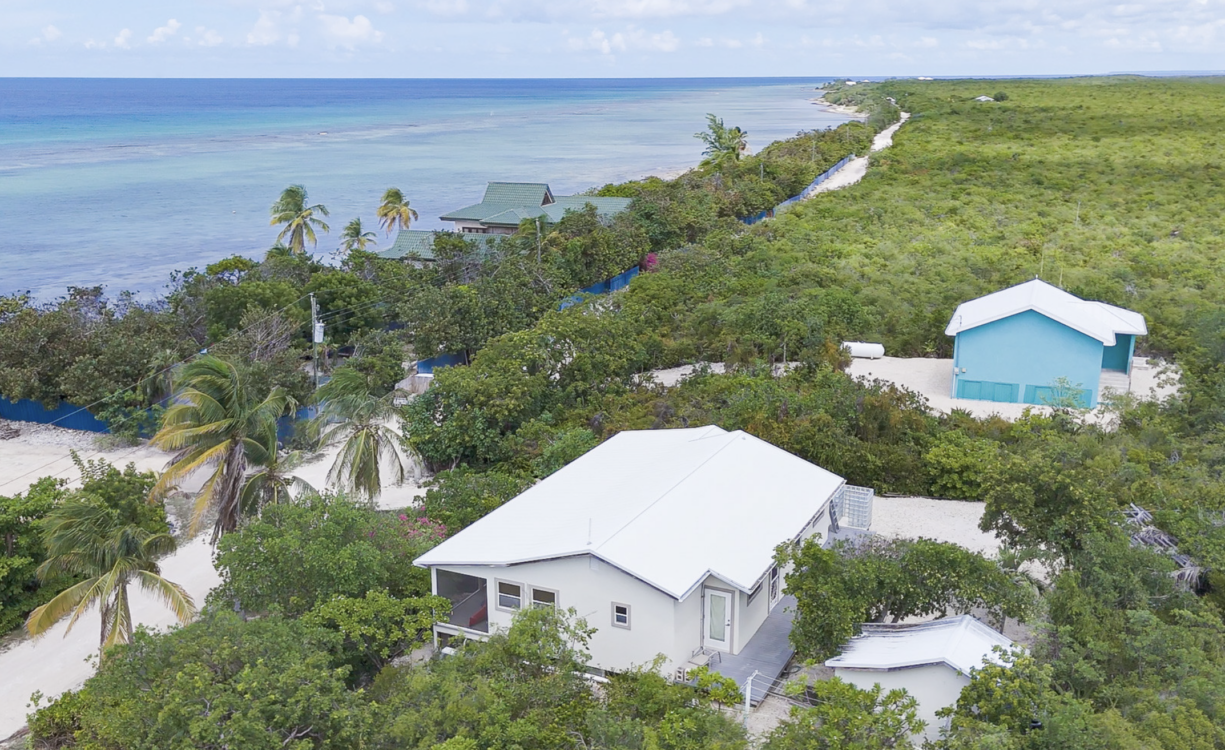 LITTLE CAYMAN OCEAN VIEW RESIDENTIAL HOME WITH BEACHFRONT LOT