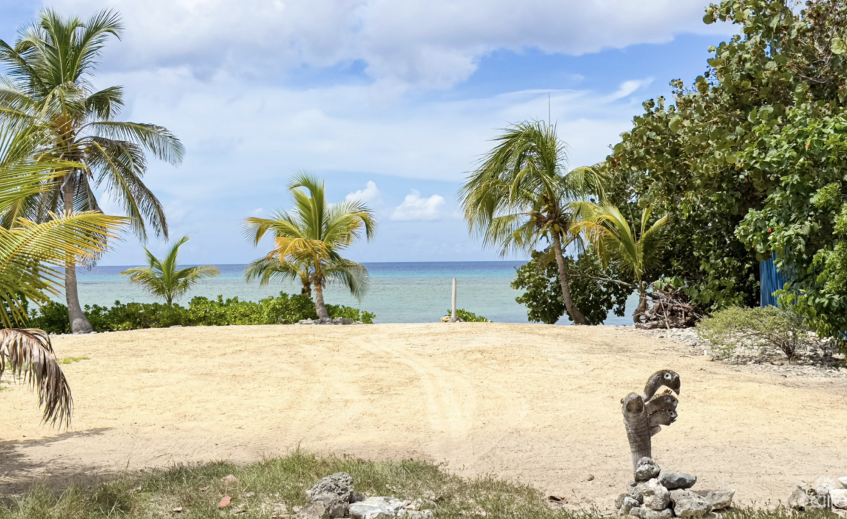 LITTLE CAYMAN OCEAN VIEW RESIDENTIAL HOME WITH BEACHFRONT LOT