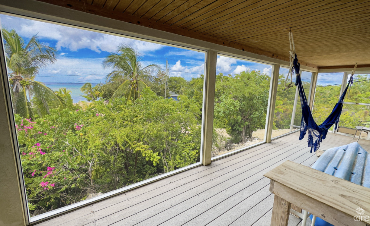 LITTLE CAYMAN OCEAN VIEW RESIDENTIAL HOME WITH BEACHFRONT LOT