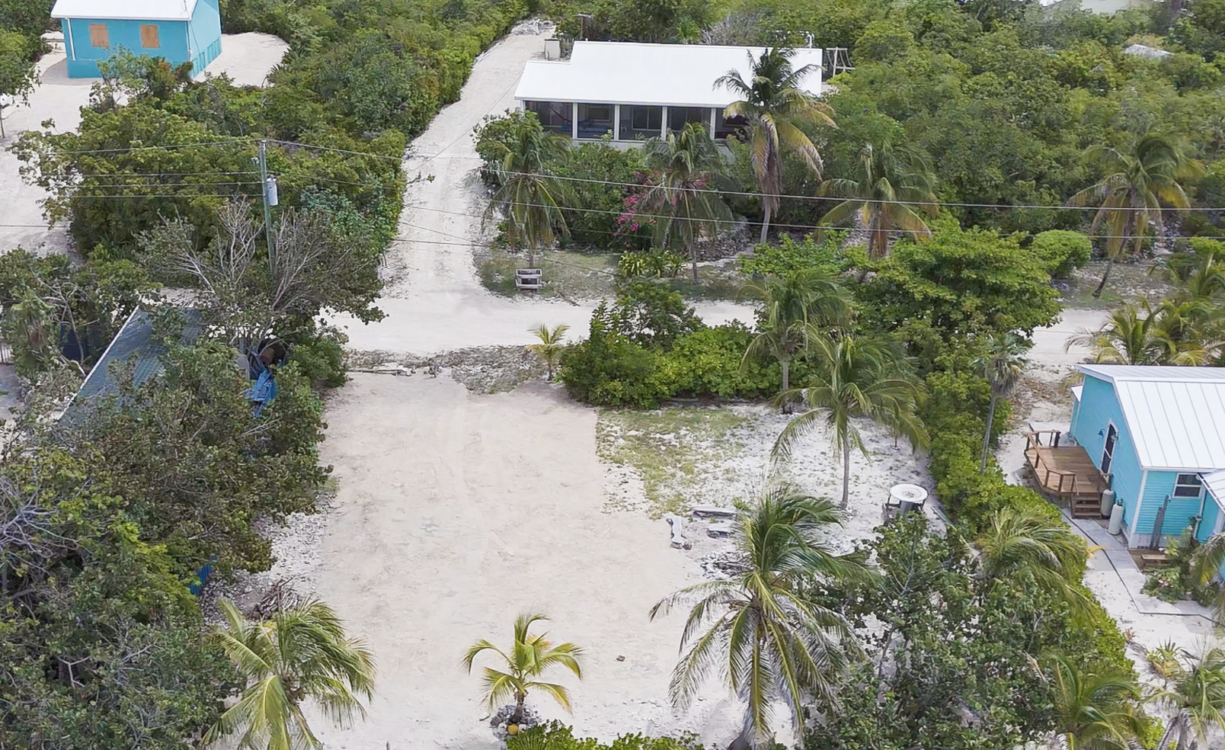 LITTLE CAYMAN OCEAN VIEW RESIDENTIAL HOME WITH BEACHFRONT LOT